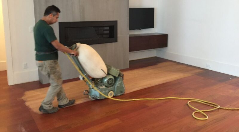 Do you need to clean the wood before sanding the floor